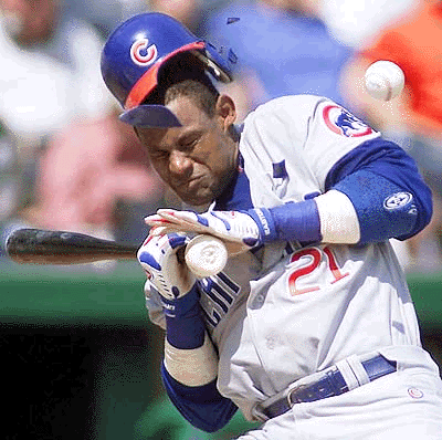 Sammy Sosa gets hit in the head by a Salmon Torres pitch